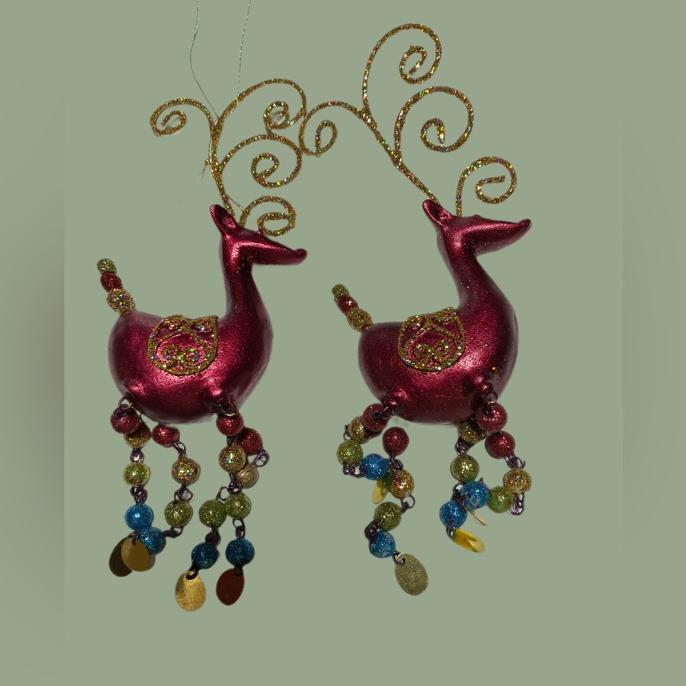 2  x Pier 1 Imports Reindeer ornaments with glittery antlers and beaded legs.